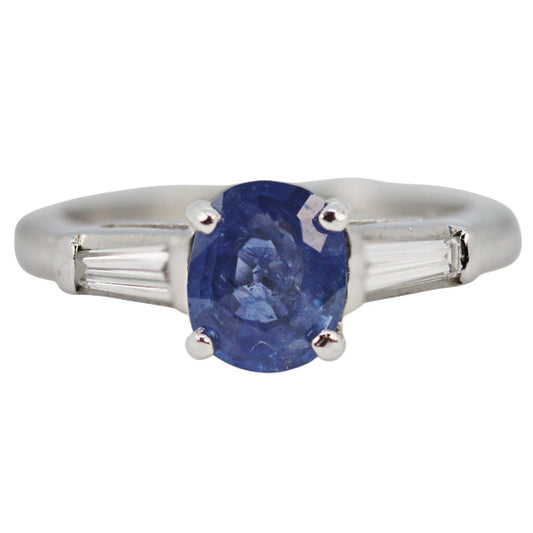 Natural Burmese Oval Cut Sapphire Ring w. Tapered Baguette Shoulders Mounted in Platinum