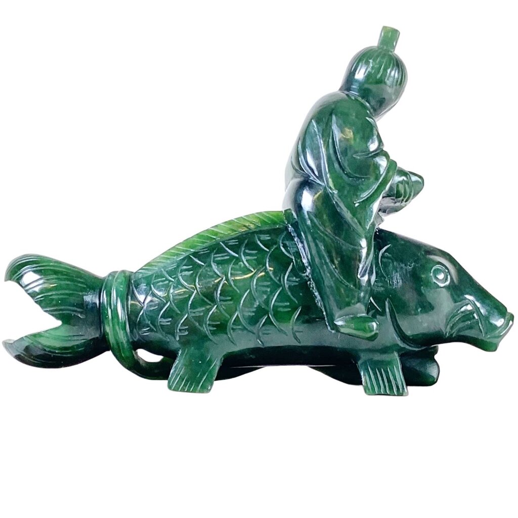 Jade Carving of a Man on Fishback