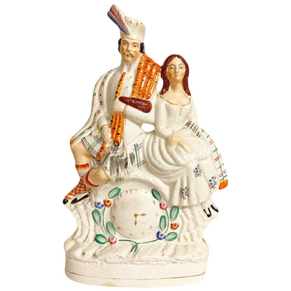 Large Staffordshire Mid 19th C. Figure of a Couple with Clock