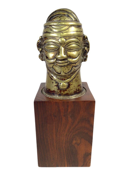 Brass Shiva Mukhalingam on Wooden Block