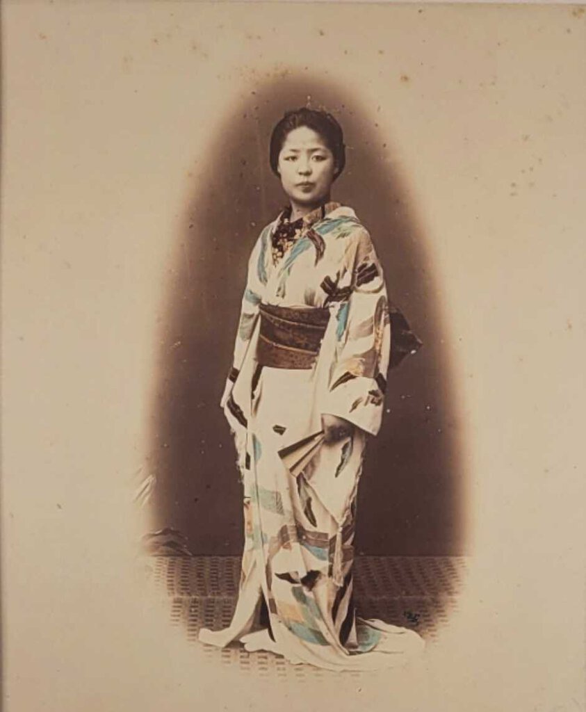 Kusakabe Kimbei, "Woman with Potted Plant". Colored Albumen Print, ca. 1880.