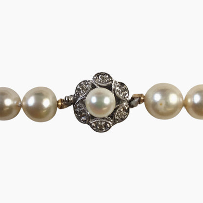 Strand of Cultured Pearls w. 14Kt White Gold Diamond and Pearl Clasp