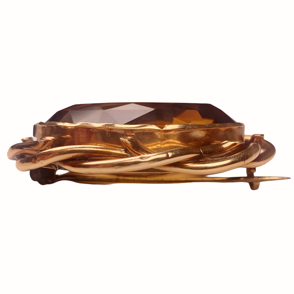 Very Substantial Faceted Oval Cut Citrine Mounted as a Brooch in a Gold Tone Frame