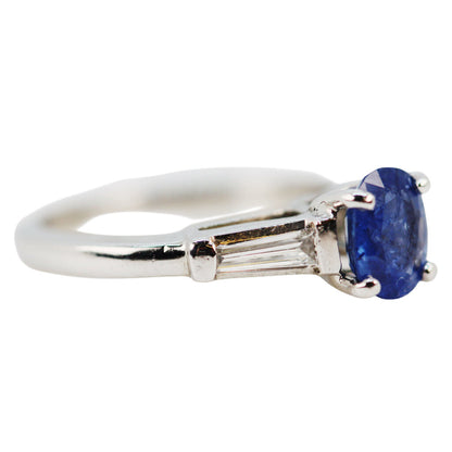 Natural Burmese Oval Cut Sapphire Ring w. Tapered Baguette Shoulders Mounted in Platinum