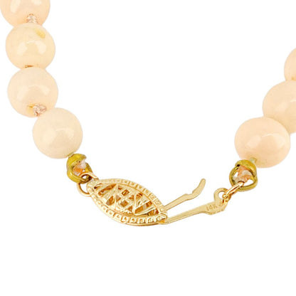 Angel Skin Coral 5mm Bead Necklace. 14kt Clasp. 20"