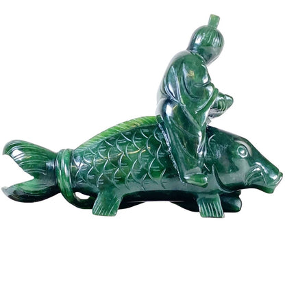 Jade Carving of a Man on Fishback