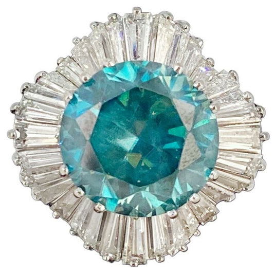 Blue Ziron Surrounded by 32 Tapered Baguettes Cut Diamonds Ring Set in Platinum