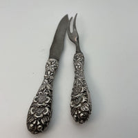 Pair Repousse Knife & Fork Carving Set