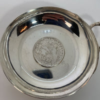 Greek Coin Inserted Into Wine Taster