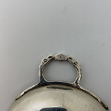 Greek Coin Inserted Into Wine Taster