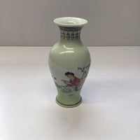 Porcelain Bud Vase with Reading Figure