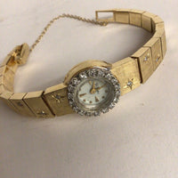14Kt yellow gold and diamond Elbee ladies watch