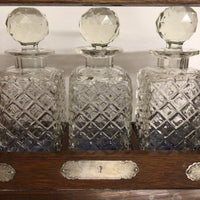 Antique Tantalus with 3 Carafes and Silver Mounts