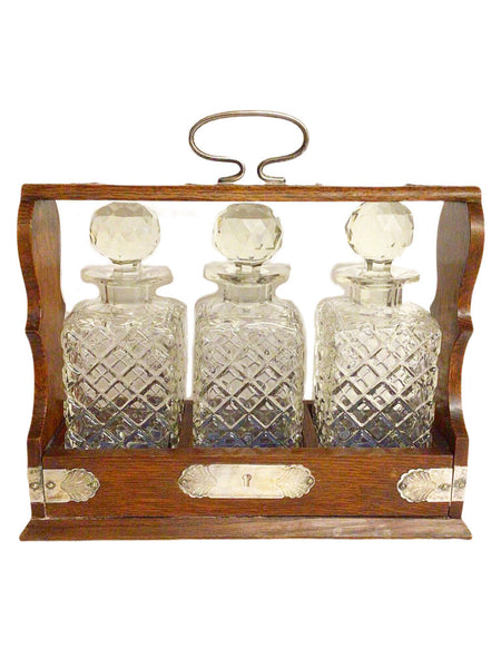 Antique Tantalus with 3 Carafes and Silver Mounts