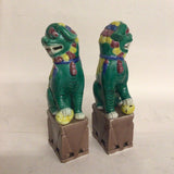 Pair of Tri-color Glaze Lion Statues on Pedestals