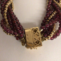 14Kt Yellow Gold and Garnet Torsade Necklace